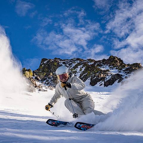 Amie Engerbretson skiing on a powder day