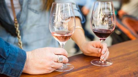 A close up of two wine glasses at Alpen Wine Fest at Palisades Tahoe.