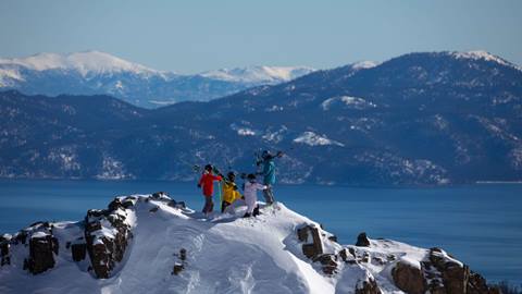 Palisades Tahoe team overlooking Lake Tahoe.