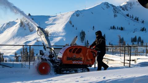 Snowblowing Gold Coast Deck at Palisades Tahoe. 