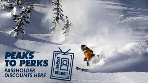 Skier riding in Powder down Granite Chief at Palisades Tahoe.