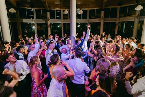 Wedding guests dancing the night away. 