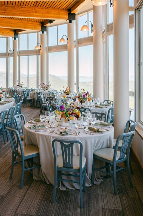 Chic table arrangement at a wedding venue in a rotunda-view restaurant.