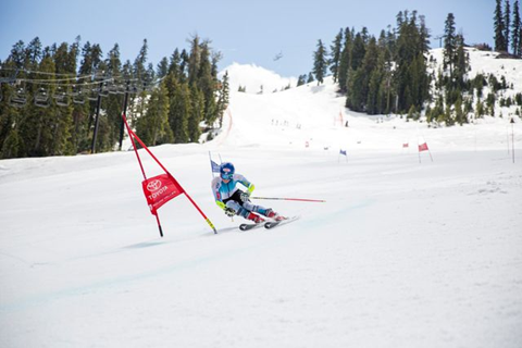 Skier racing down the mountain at Palisades Tahoe 